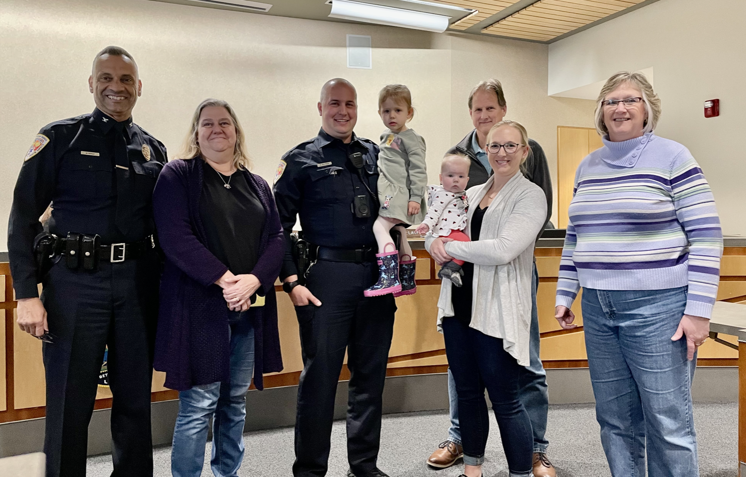 Cory Buter with family and EGR Public Safety Chief Mark Herald at the May 1 City Commission meeting.